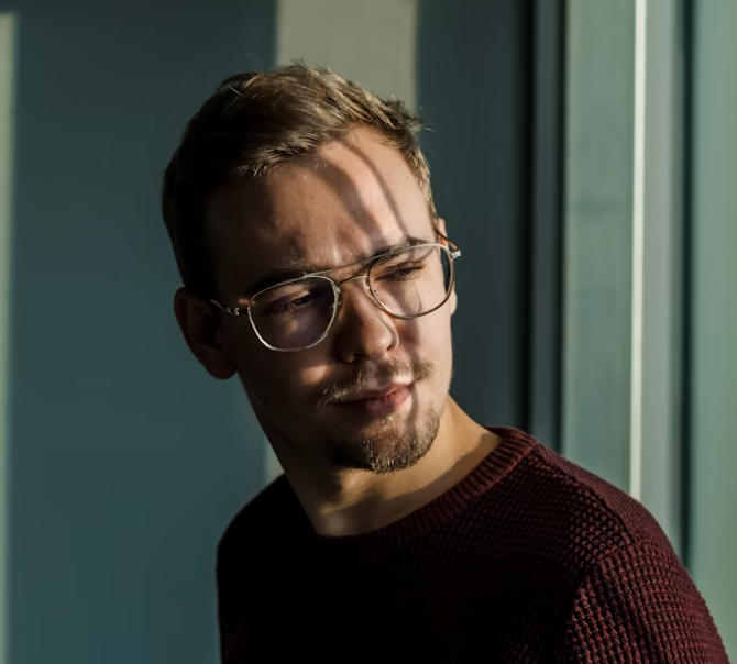 Man wearing glasses in office